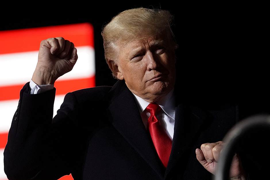 Former President Donald Trump gesturing during a rally in Conroe, Texas, on January 29.
