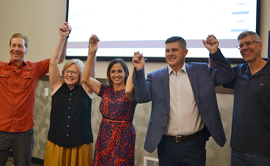 Supporter Ed Cracraft, CD7 Rep. Michelle Fischbach, wife Jackie Finstad, Brad Finstad and former CD3 Rep. Erik Paulsen celebrating on Tuesday night at the Sleepy Eye Event Center.