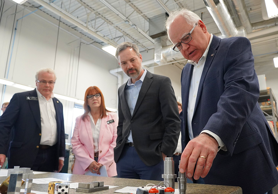 DEED Commissioner Matt Varilek, center, and Gov. Tim Walz, right, shown during a statewide workforce tour at Buhler Inc. in Plymouth.
