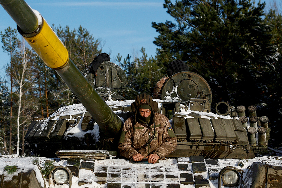 A Ukrainian serviceman sits in a tank during anti-sabotage drills in the Chernihiv region, Ukraine.