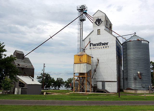 Panther Distillery, of Osakis, is advertised on a grain elevator